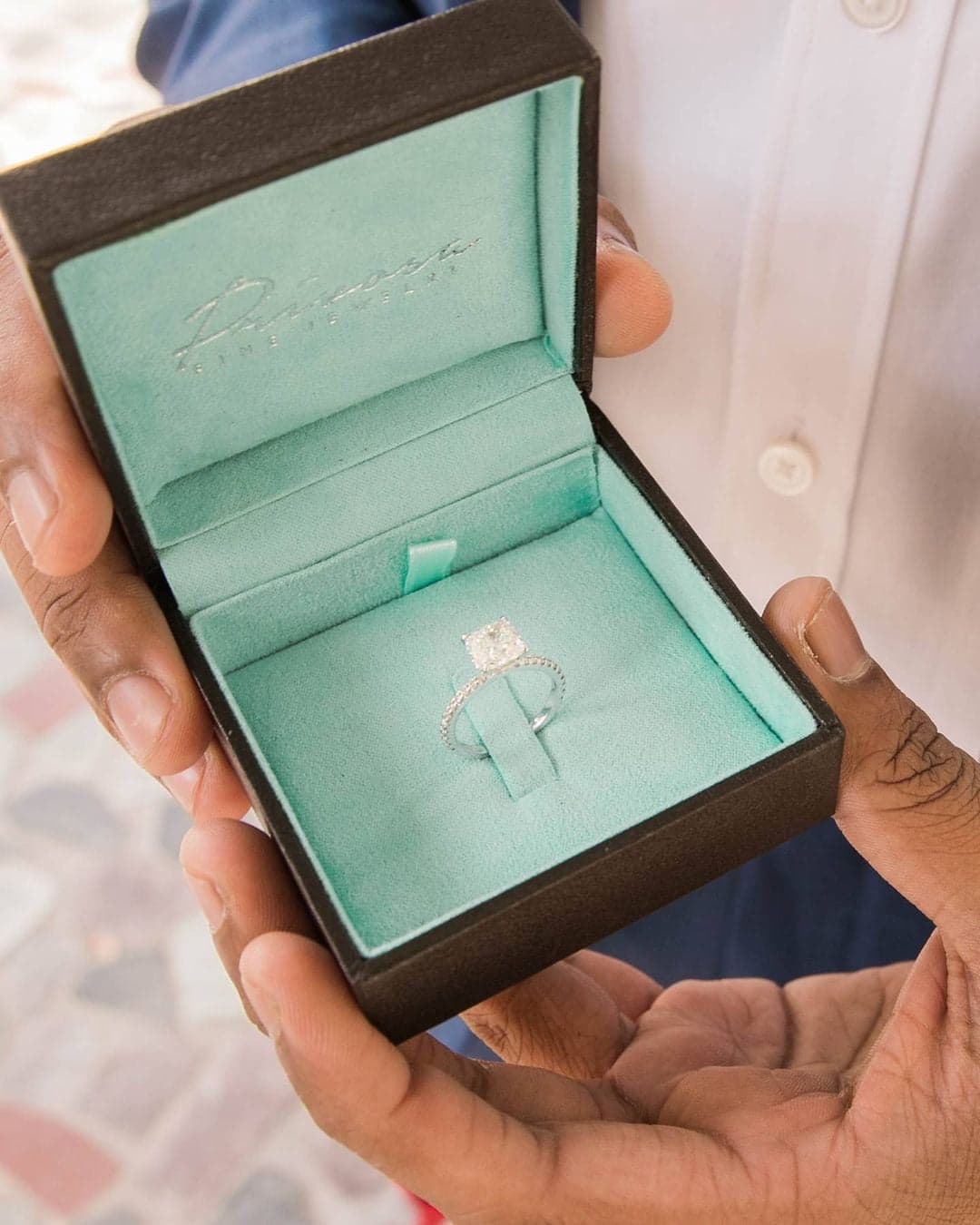 A Privosa engagement ring presented in its box