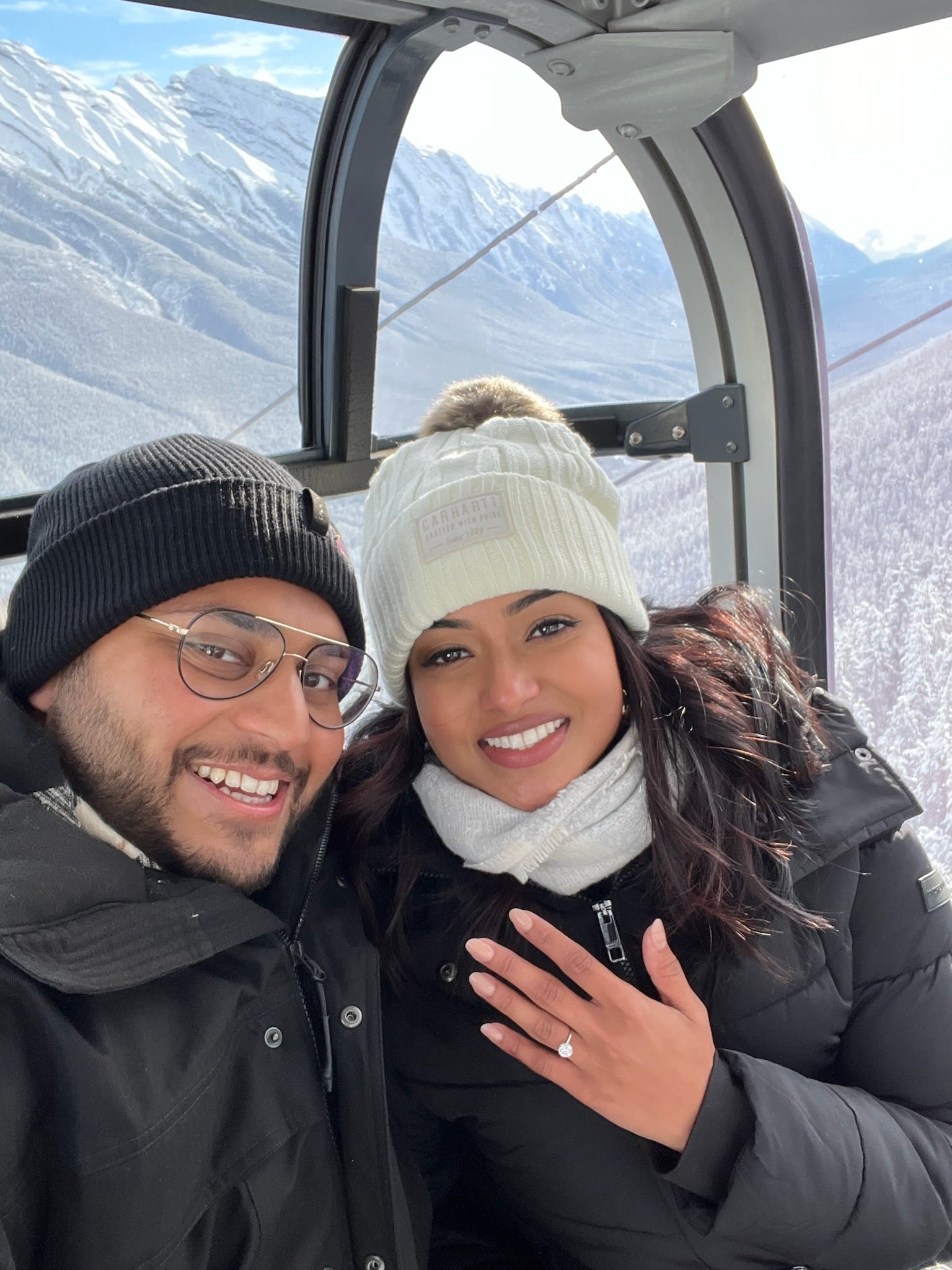 A couple celebrating their engagement on a getaway